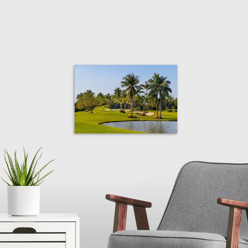 A modern room featuring Florida, Boca Raton, golf course with palm trees.