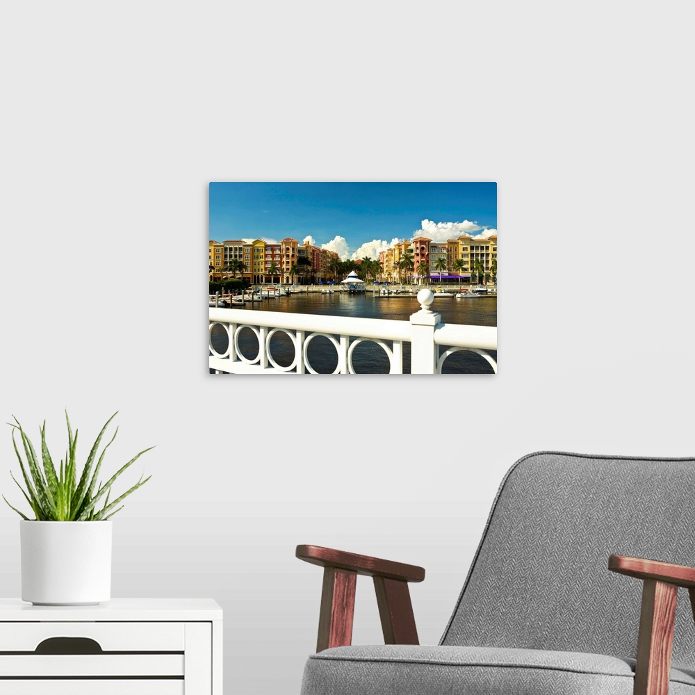 A modern room featuring Florida, Naples, Bayfront buildings and marina.