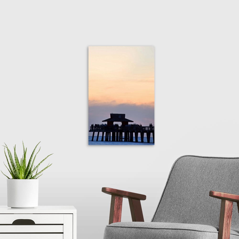 A modern room featuring Florida, Naples, beach and Naples Pier at sunset.