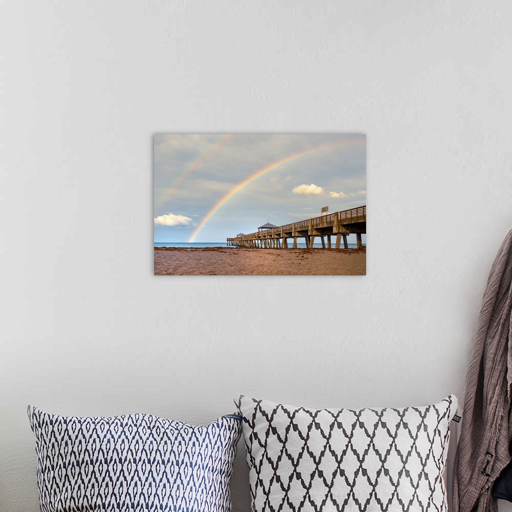 A bohemian room featuring Florida, South Florida, rainbow over Juno Beach pier.