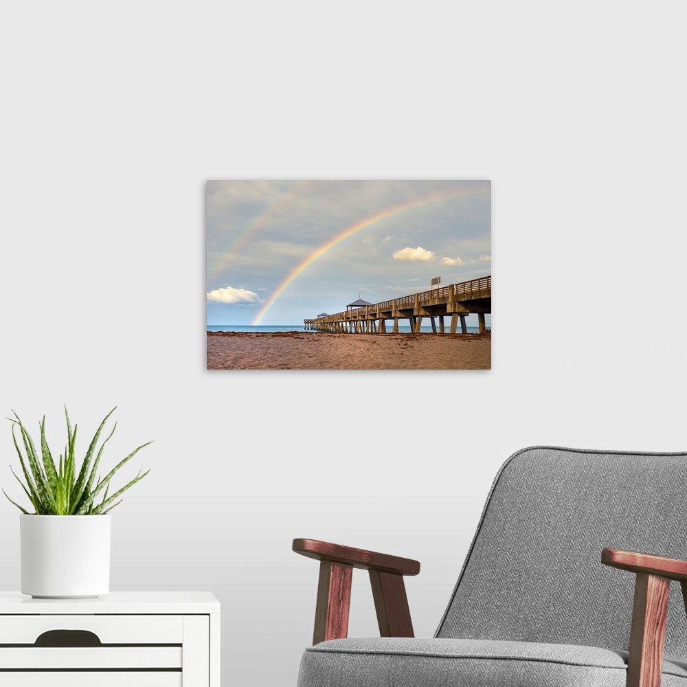 A modern room featuring Florida, South Florida, rainbow over Juno Beach pier.