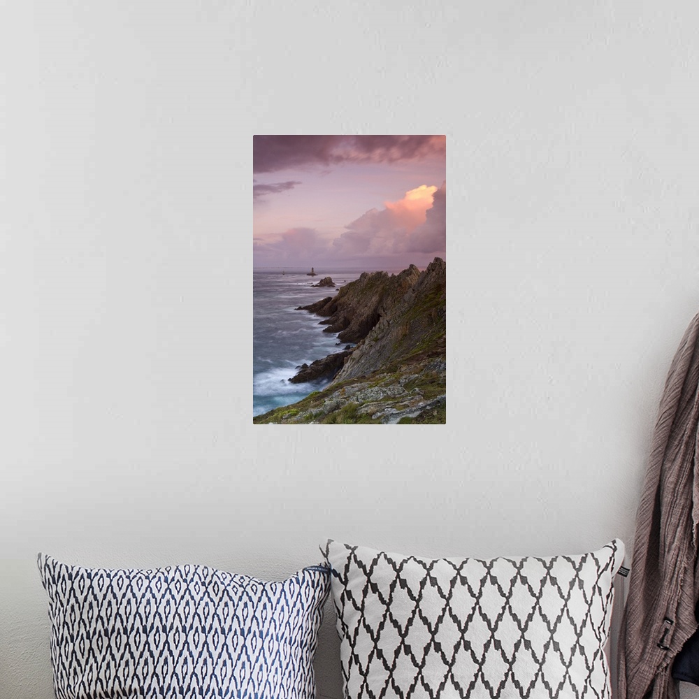 A bohemian room featuring France, Brittany, Dusk descends over the La Vieille lighthouse