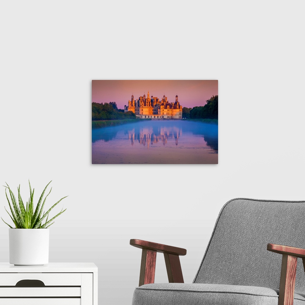 A modern room featuring France, Centre, Loire Valley, Loir-et-Cher, Chambord Castle, Castle at dawn.