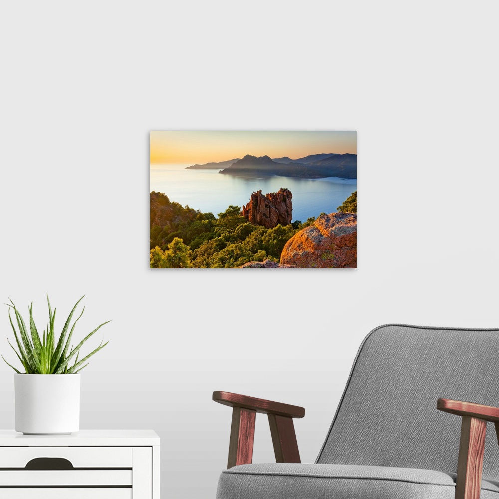 A modern room featuring France, Corsica, Mediterranean sea, Corse-du-Sud, Calanques de Piana, Typical rock formations, dusk