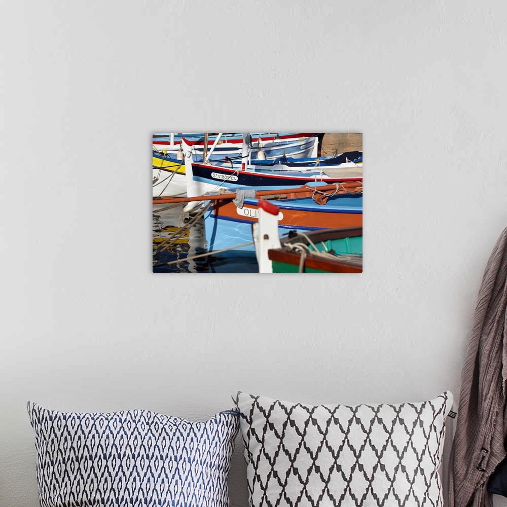 A bohemian room featuring France, Cote d'Azur, Saint-Tropez, Traditional fishing boats in the harbor.