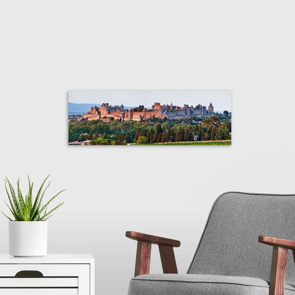 A modern room featuring France, Languedoc-Roussillon, Carcassonne, Sunset over the chateau