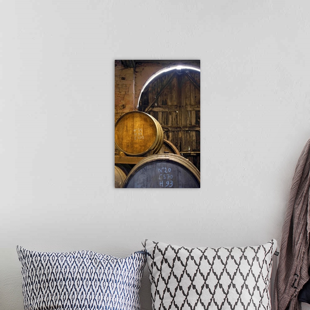 A bohemian room featuring France, Normandy, Calvados barrels in the cellar
