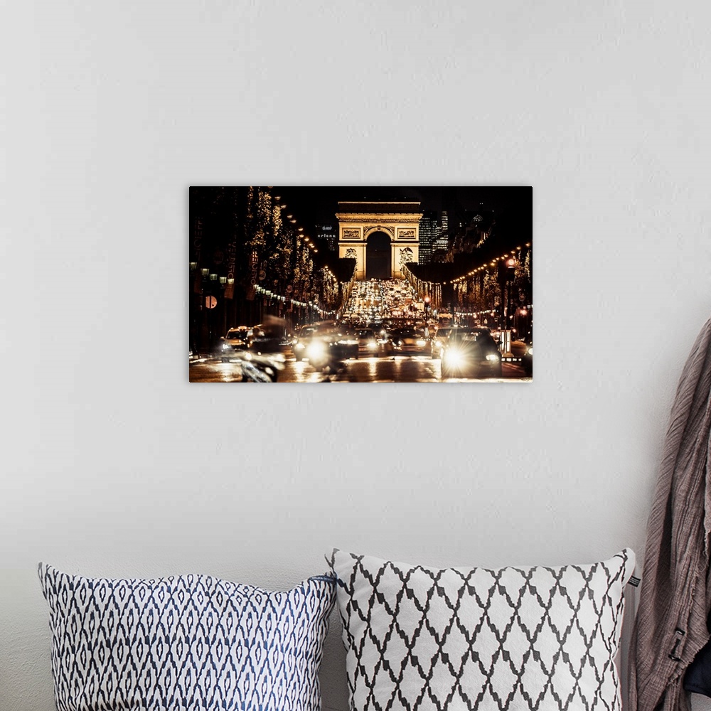 A bohemian room featuring France, Paris, Arc de Triomphe, The avenue Champs-elysees and the Arc de Triomphe at night.