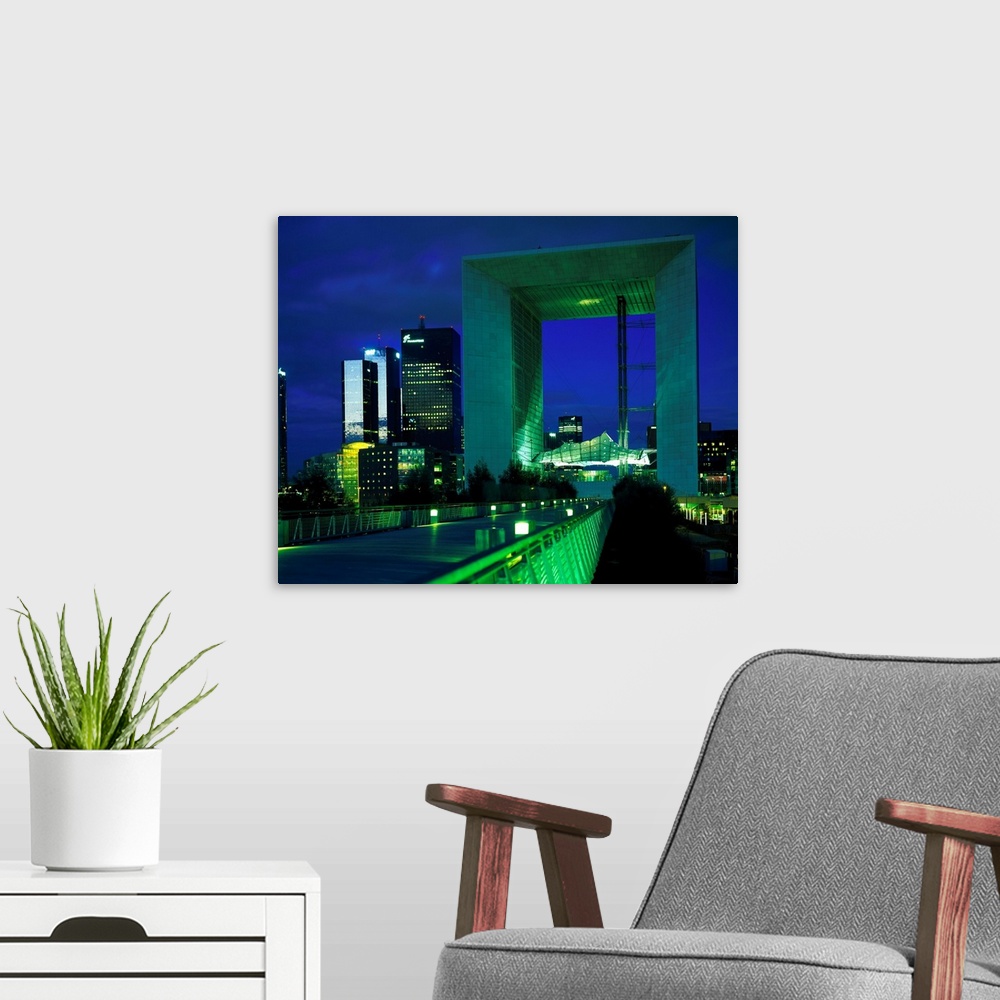 A modern room featuring France, Paris, La Defense, view of the Grand Arch, night