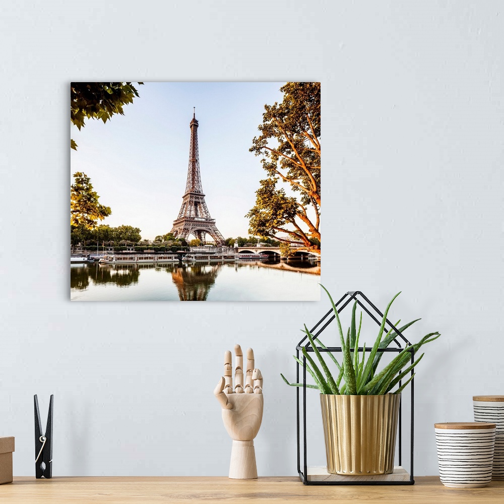 A bohemian room featuring France, Paris, The river Seine and Eiffel Tower at sunrise.