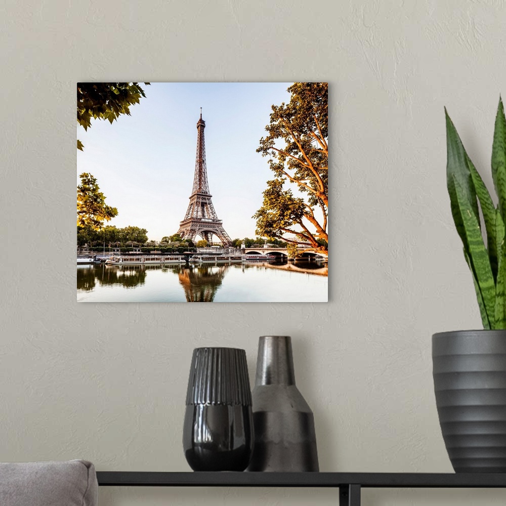 A modern room featuring France, Paris, The river Seine and Eiffel Tower at sunrise.