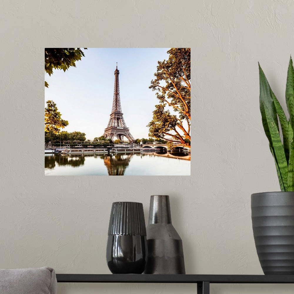 A modern room featuring France, Paris, The river Seine and Eiffel Tower at sunrise.