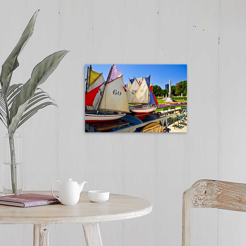 A farmhouse room featuring France, Paris, toy boats for the boat lake