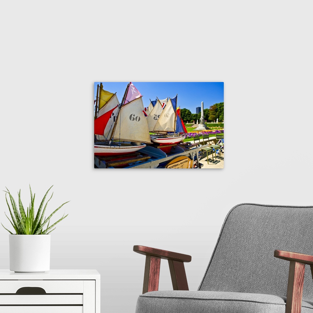 A modern room featuring France, Paris, toy boats for the boat lake
