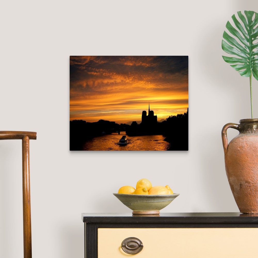 A traditional room featuring France, Paris, view of the Seine and Norte Dame at sunset