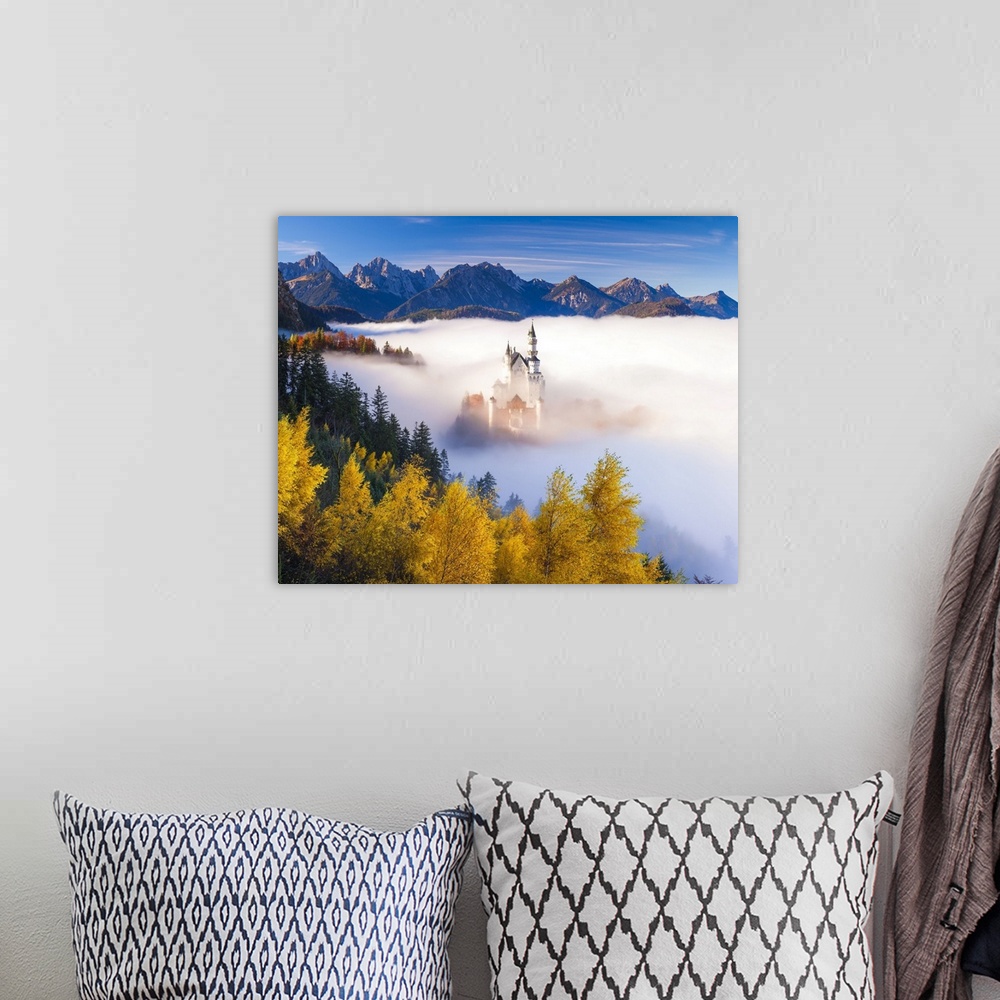 A bohemian room featuring Germany, Bavaria, Swabia, Neuschwanstein Castle in the fog, Tannheim Mountains in background