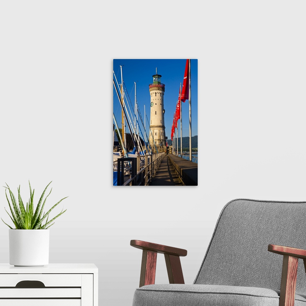 A modern room featuring Germany, Bavaria, Lake Constance, Swabia, Schwaben, Lindau, Lighthouse at the harbor entrance.