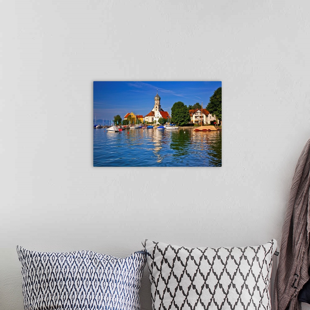 A bohemian room featuring Germany, Bavaria, Lake Constance, Swabia, Schwaben, Wasserburg, St George's Church.