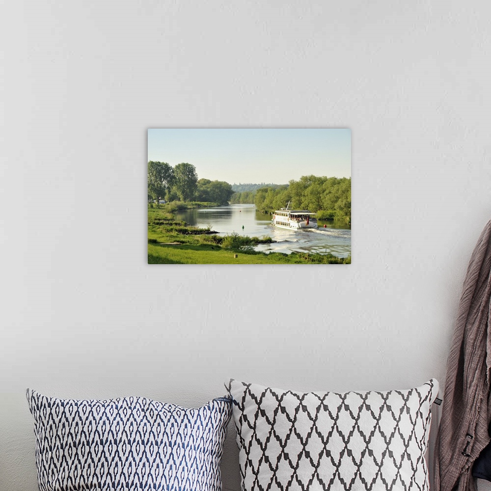A bohemian room featuring Germany, North Rhine-Westphalia, Ruhr Area, Essen, Tourist boat on the Ruhr River.