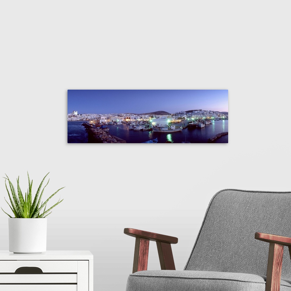 A modern room featuring Greece, Aegean islands, Cyclades, Paros island, Naousa, view of the port