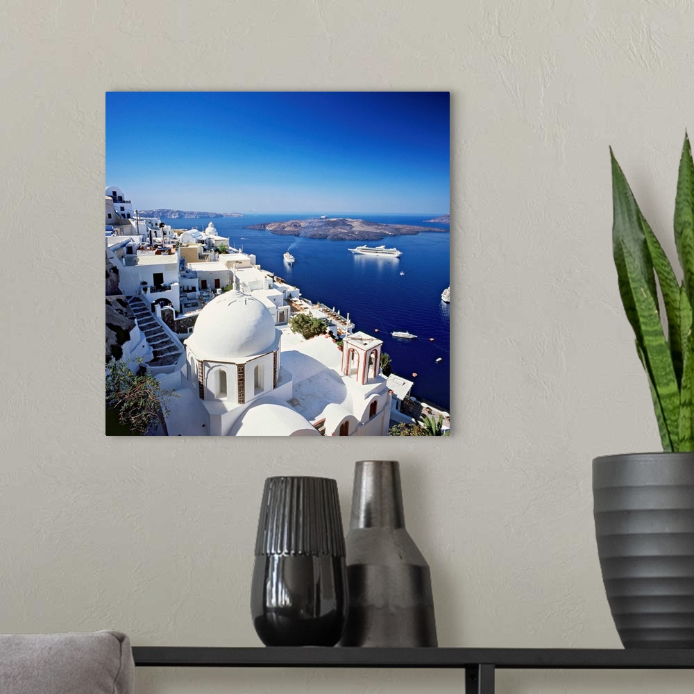 A modern room featuring Greece, Aegean islands, Cyclades, Santorini island, Thera, Fira, view towards the crater