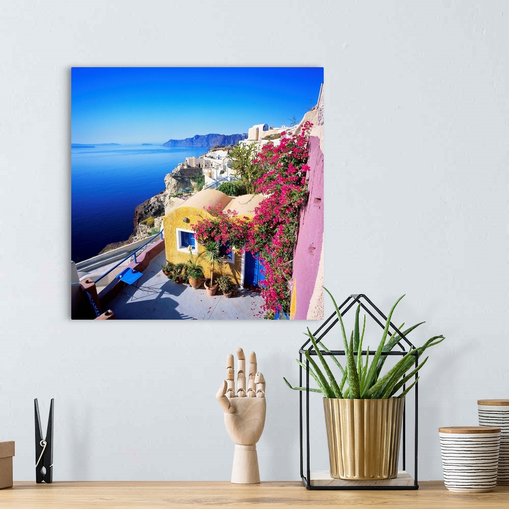 A bohemian room featuring Greece, Aegean islands, Cyclades, Santorini island, Thera, Oia, traditional houses and the crater