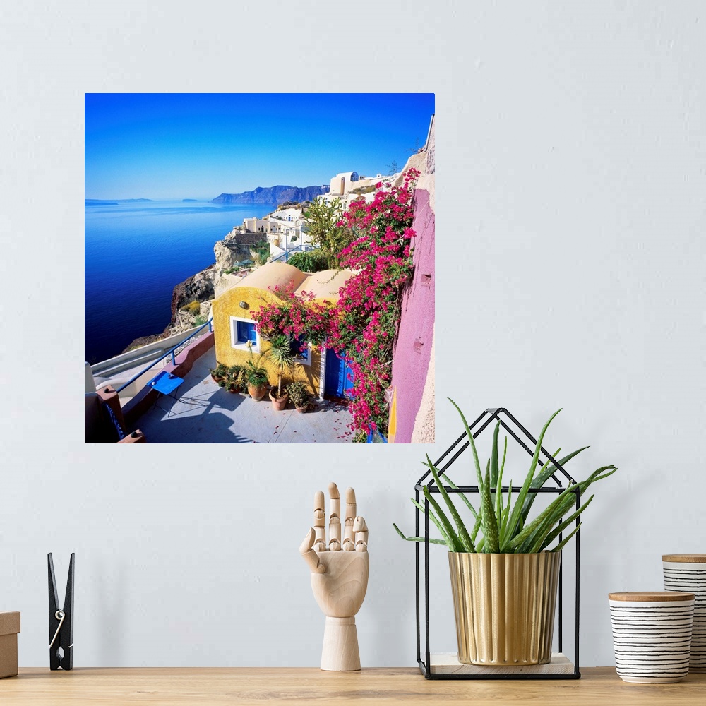 A bohemian room featuring Greece, Aegean islands, Cyclades, Santorini island, Thera, Oia, traditional houses and the crater
