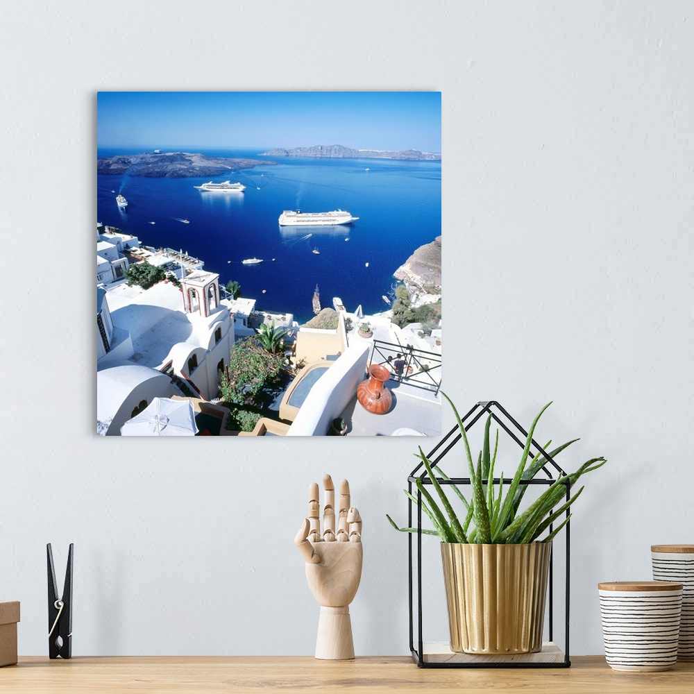 A bohemian room featuring Greece, Aegean islands, Santorini, Fira, view towards cruise ships in the crater