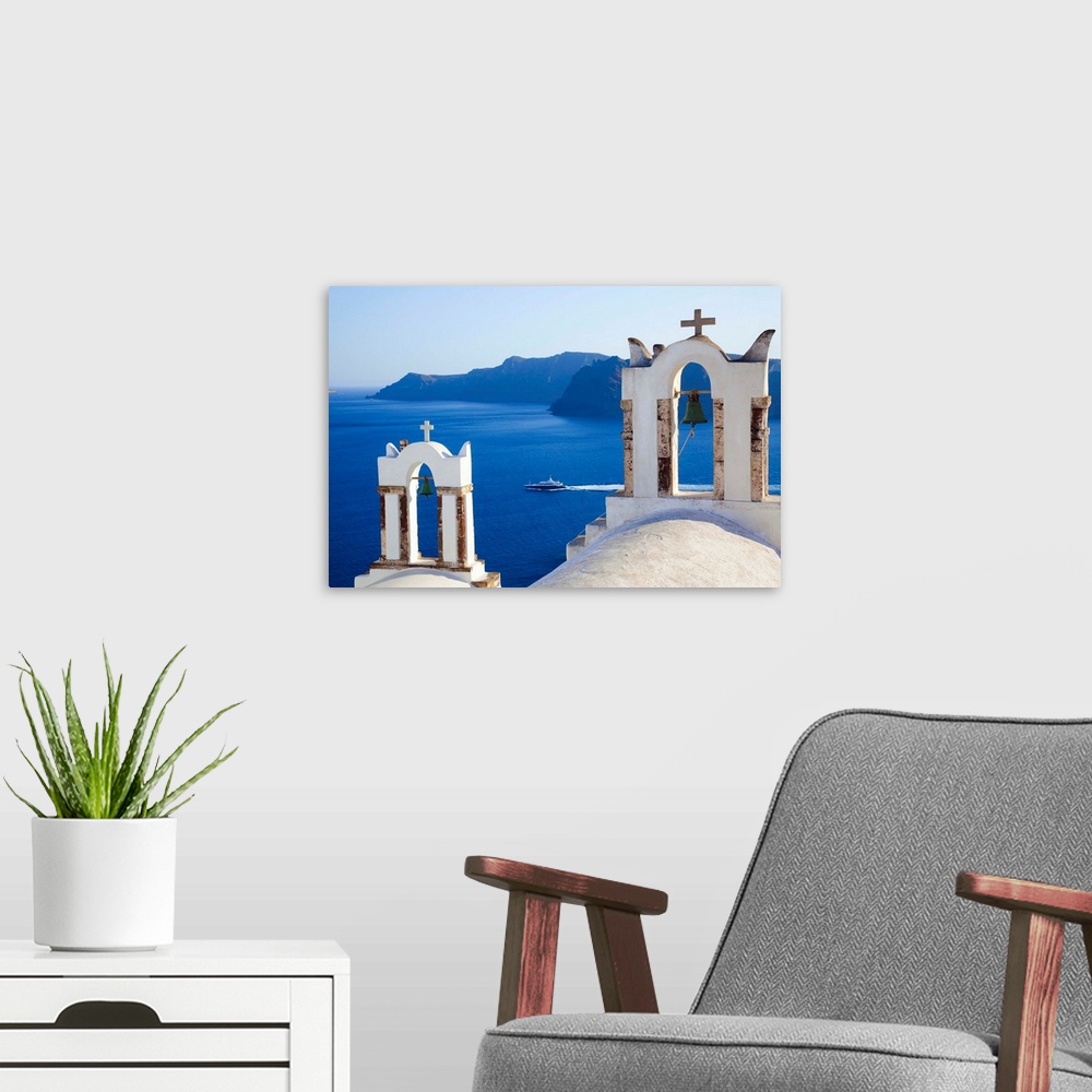 A modern room featuring Greece, Aegean islands, Mediterranean sea, Aegean sea, Greek Islands, Cyclades, Santorini island,...
