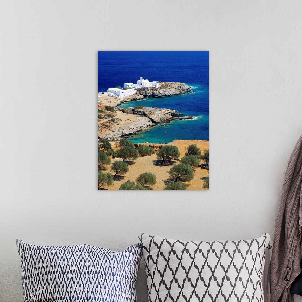A bohemian room featuring Greece, Sifnos, Kastro, Church of Chryssopigi, sunbathers in foreground