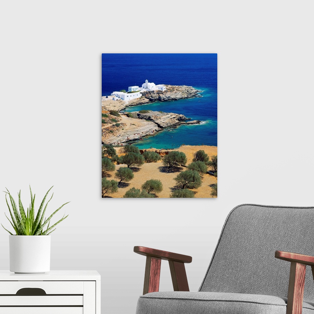 A modern room featuring Greece, Sifnos, Kastro, Church of Chryssopigi, sunbathers in foreground
