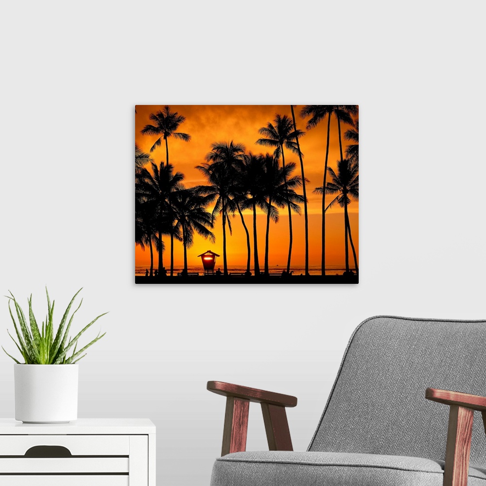 A modern room featuring Hawaii, Oahu, Honolulu, Waikiki beach at sunset with palm-trees