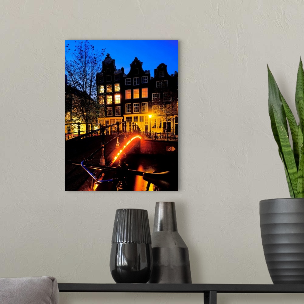 A modern room featuring Holland, Amsterdam, typical house and bridge at night