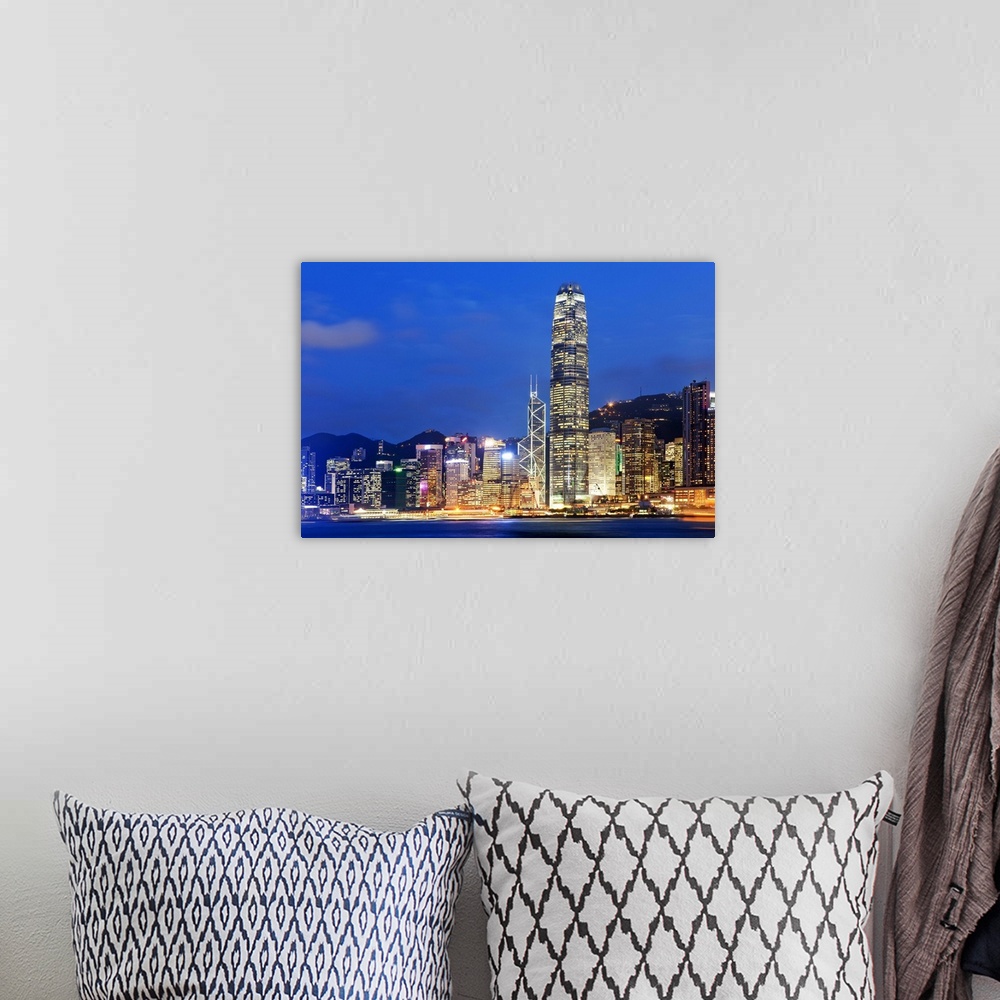 A bohemian room featuring China, Hong Kong, Hong Kong island, City skyline illuminated at night with International Finance ...