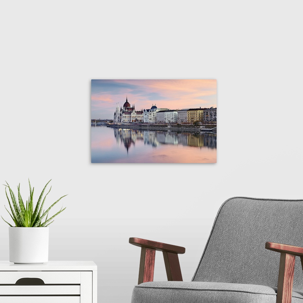 A modern room featuring Hungary, Budapest, The Danube river and the Parliament building