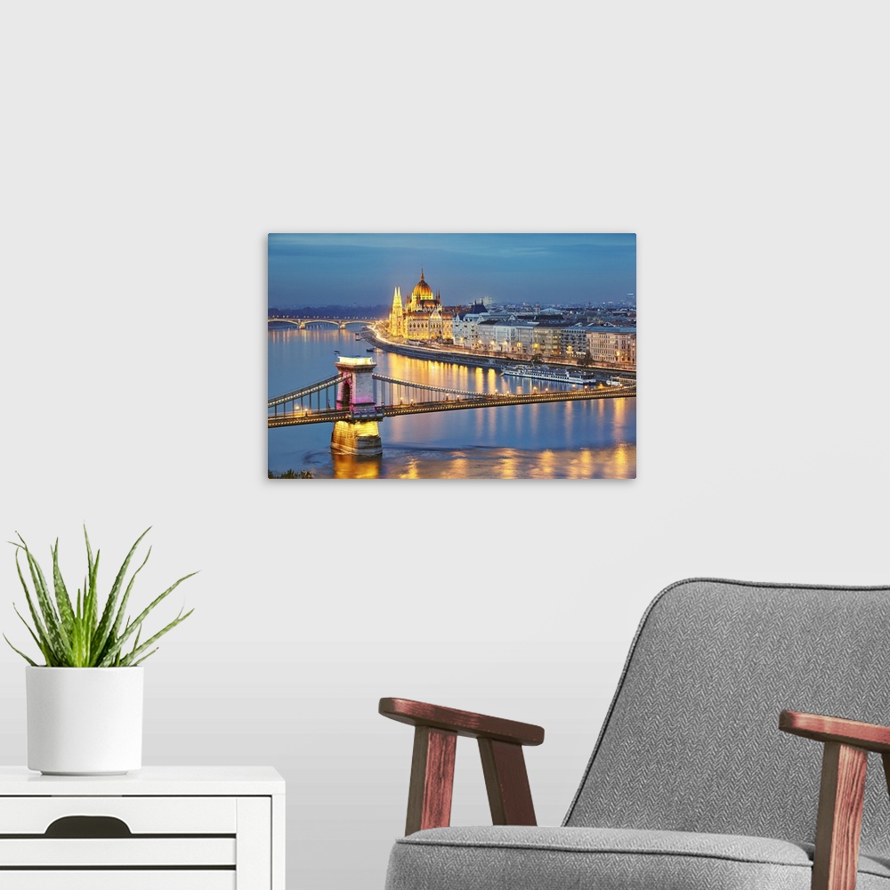A modern room featuring Hungary, Budapest, View of the Danube river, Chain Bridge, Szechenyi Lanchid, and the Parliament ...