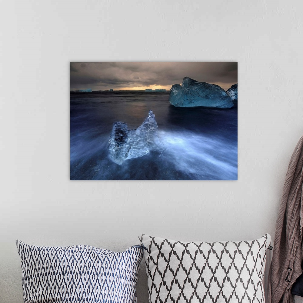 A bohemian room featuring Iceland, South Iceland, Jokulsarlon, Small piece of ice in the beach of Jokulsarlon.