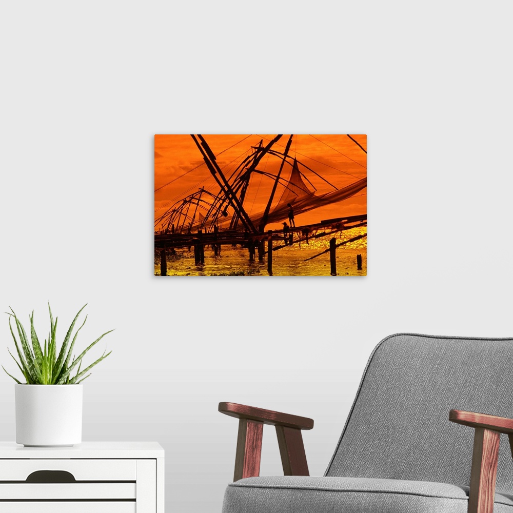 A modern room featuring India, Kerala, Fishing net at sunset