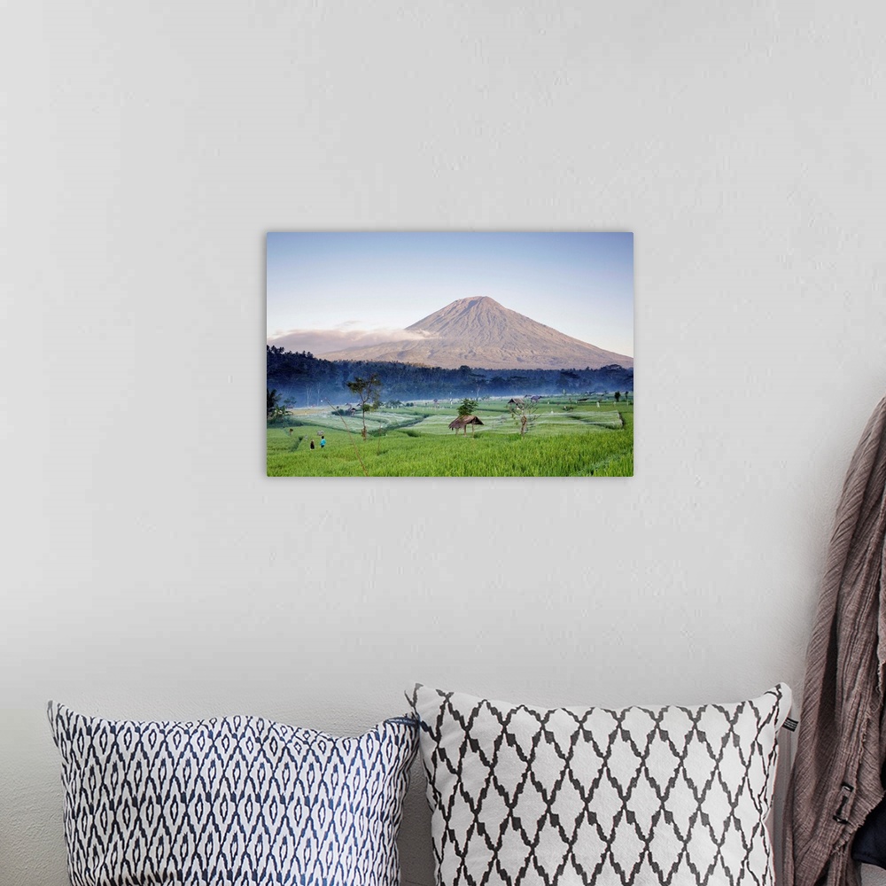 A bohemian room featuring Indonesia, Bali, Mount Agung over rice terraces of the Abang region in early morning.