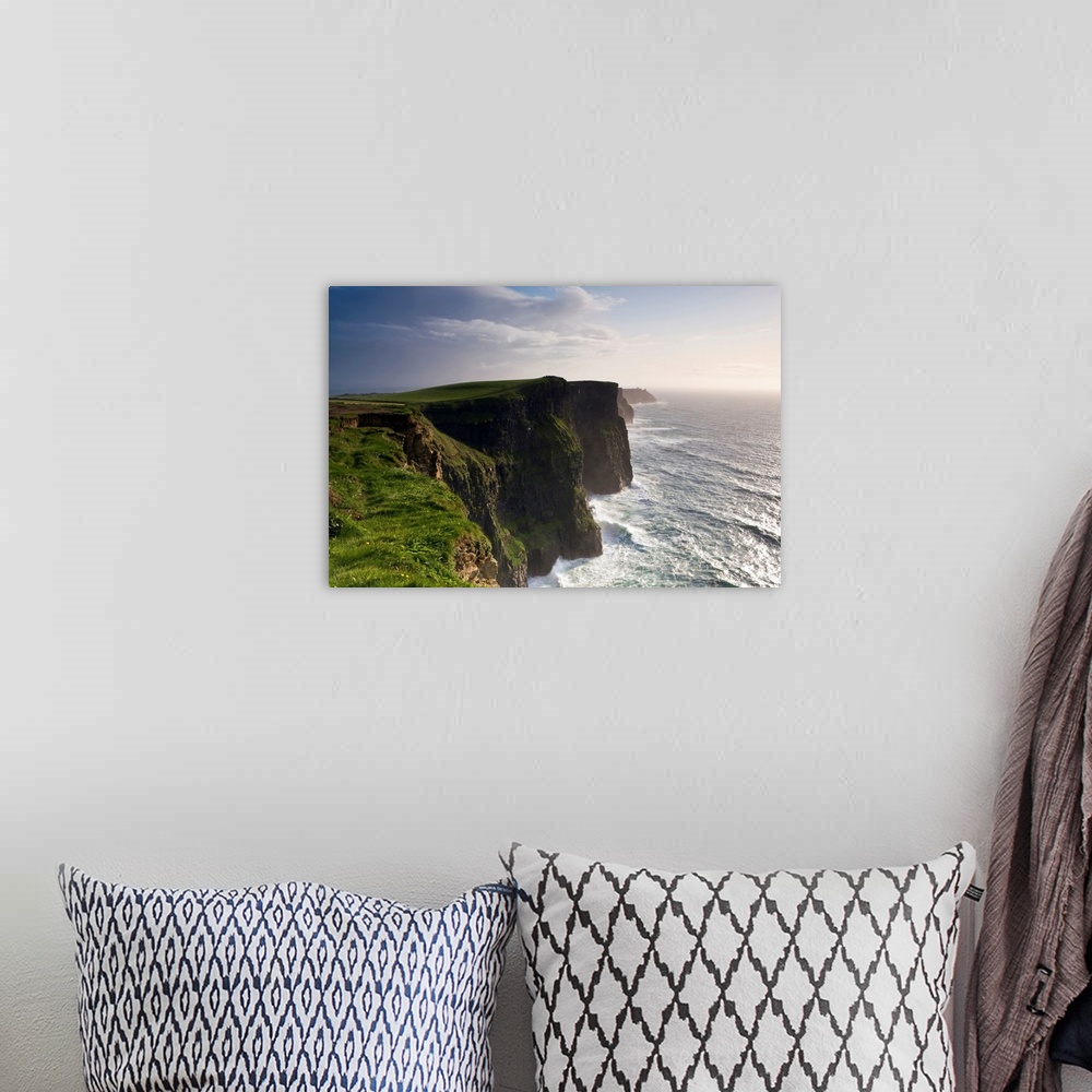 A bohemian room featuring Ireland, Clare, The wild waves of Atlantic Ocean storms pound Cliffs of Moher