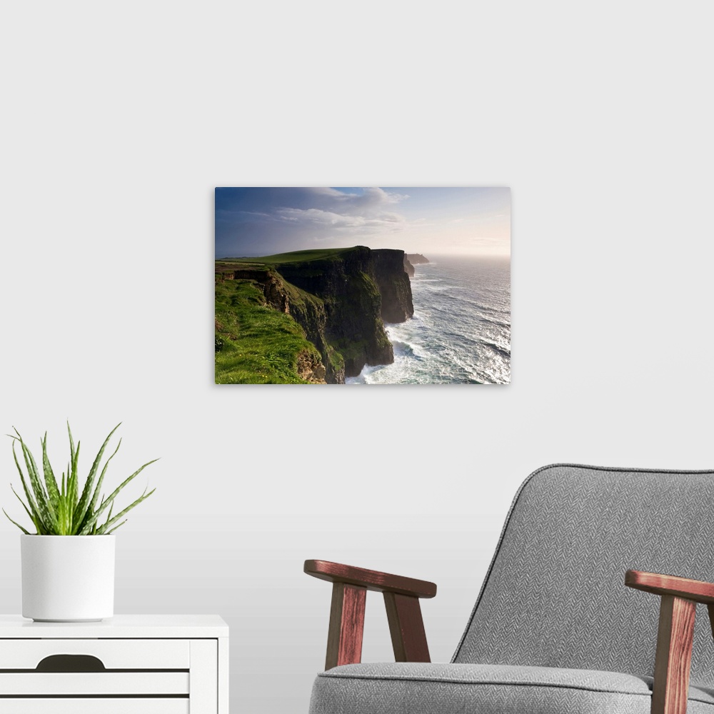 A modern room featuring Ireland, Clare, The wild waves of Atlantic Ocean storms pound Cliffs of Moher