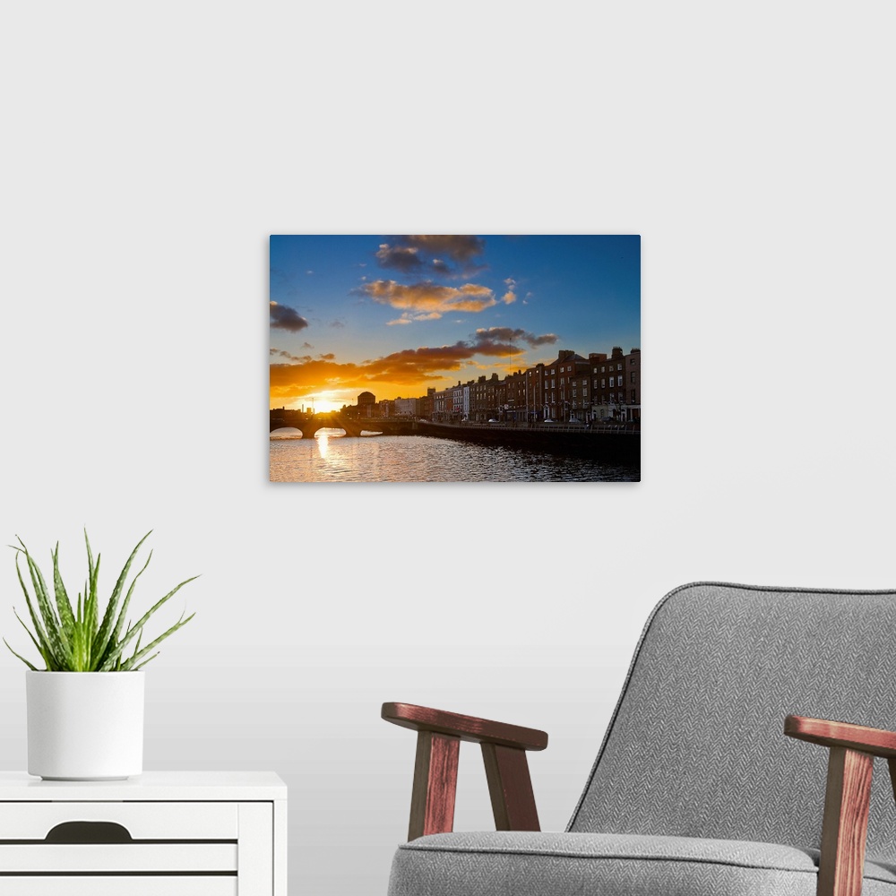 A modern room featuring Ireland, Dublin, Liffey riverside at sunset