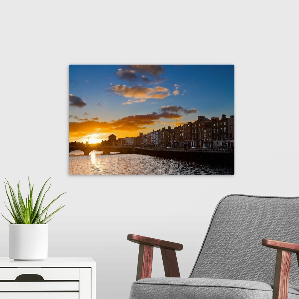 A modern room featuring Ireland, Dublin, Liffey riverside at sunset