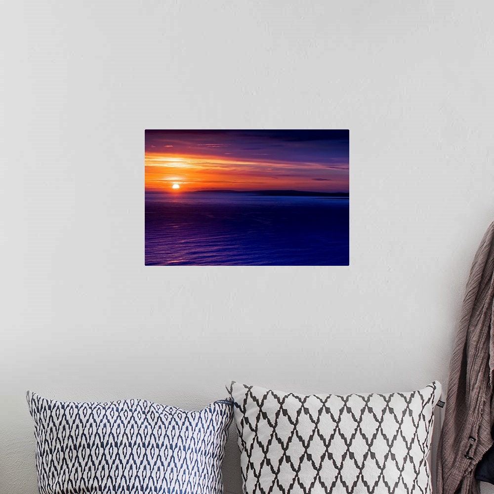 A bohemian room featuring Ireland, Galway, Sunset on the Atlantic Ocean.