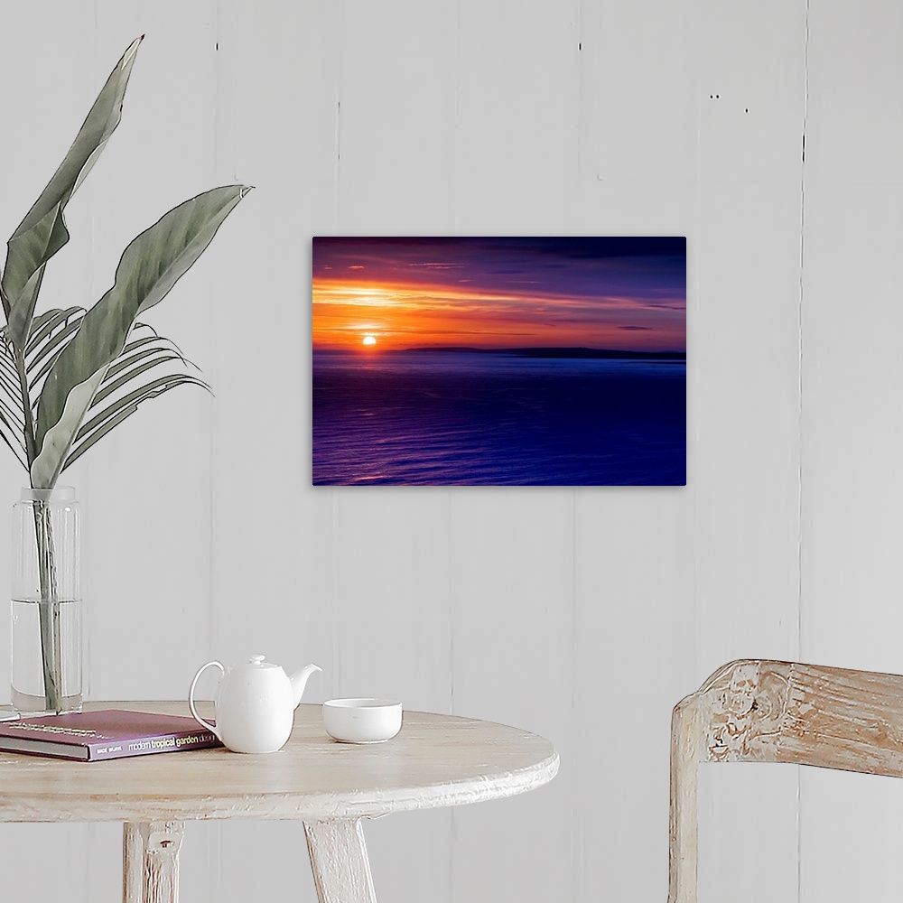 A farmhouse room featuring Ireland, Galway, Sunset on the Atlantic Ocean.