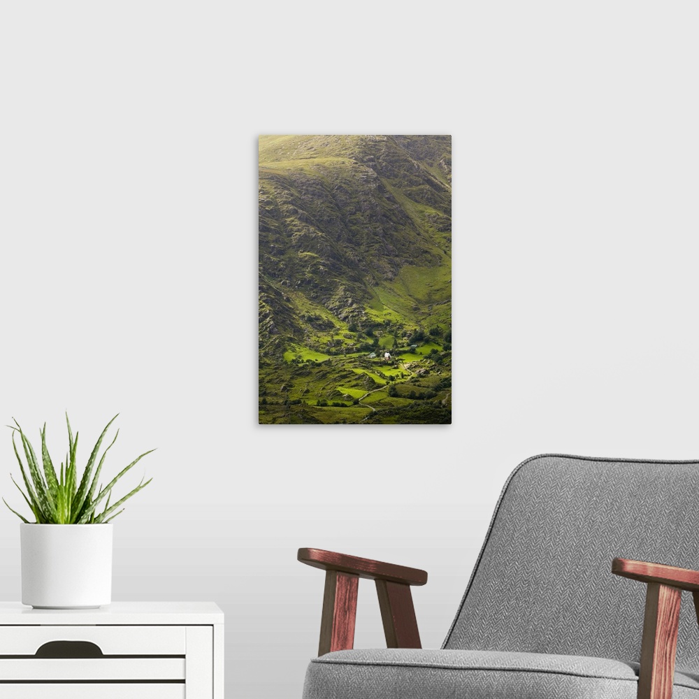 A modern room featuring Ireland, Kerry, afternoon light illuminates rugged rural Landscape
