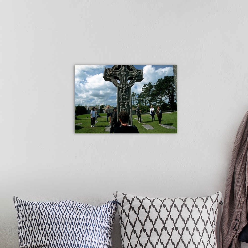 A bohemian room featuring Ireland, Offaly, Clonmacnoise, The ancient monastic site of Clonmacnoise, cross