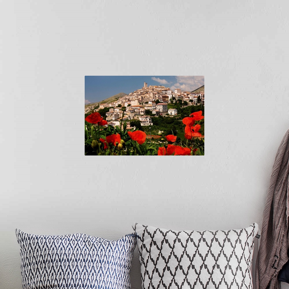 A bohemian room featuring Italy, Abruzzo, Gran Sasso National Park, L'Aquila district, Poppies and town