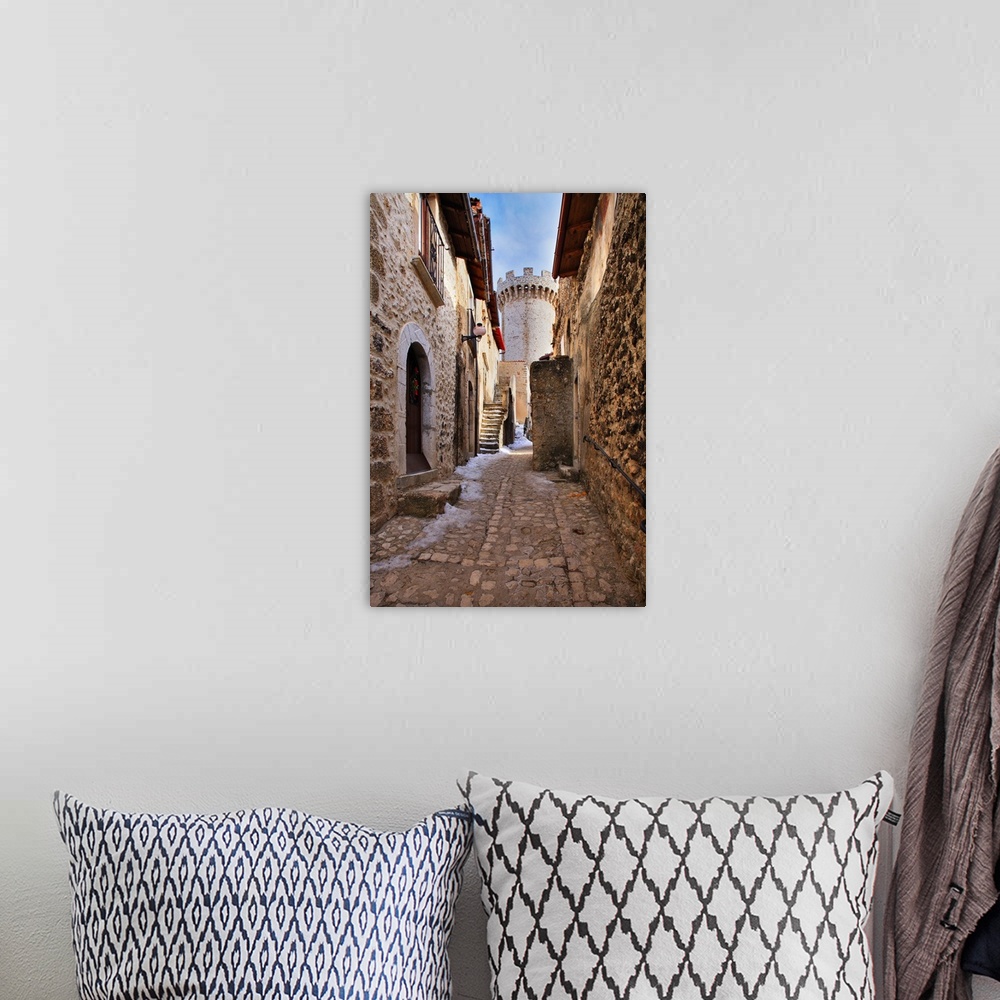 A bohemian room featuring Italy, Abruzzo, L'Aquila district, View of the medieval tower in the village center