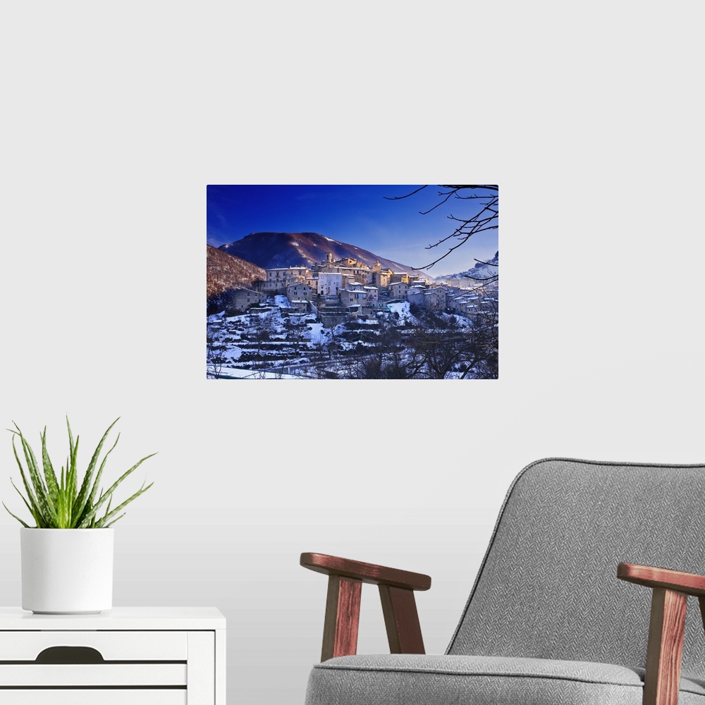 A modern room featuring Italy, Abruzzo, View of the medieval village located in the Sagittario Gorges